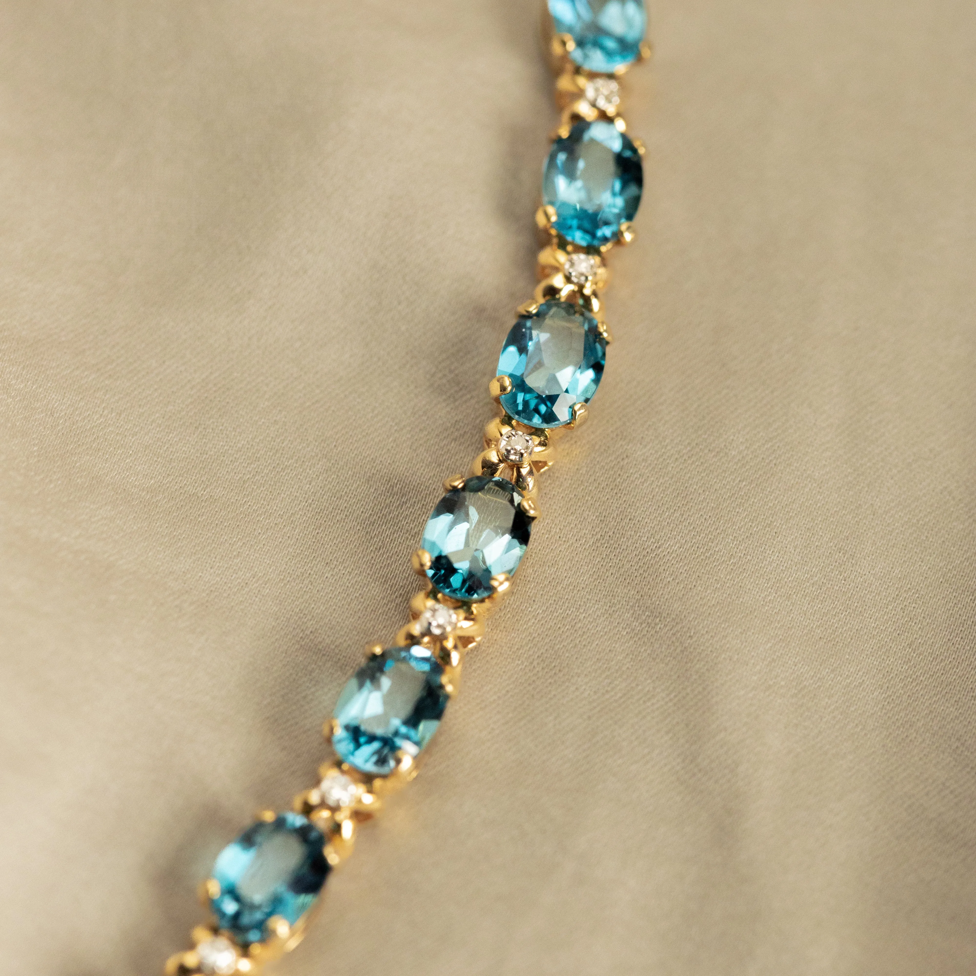 14K Yellow Gold Oval Blue Topaz Diamond Bracelet