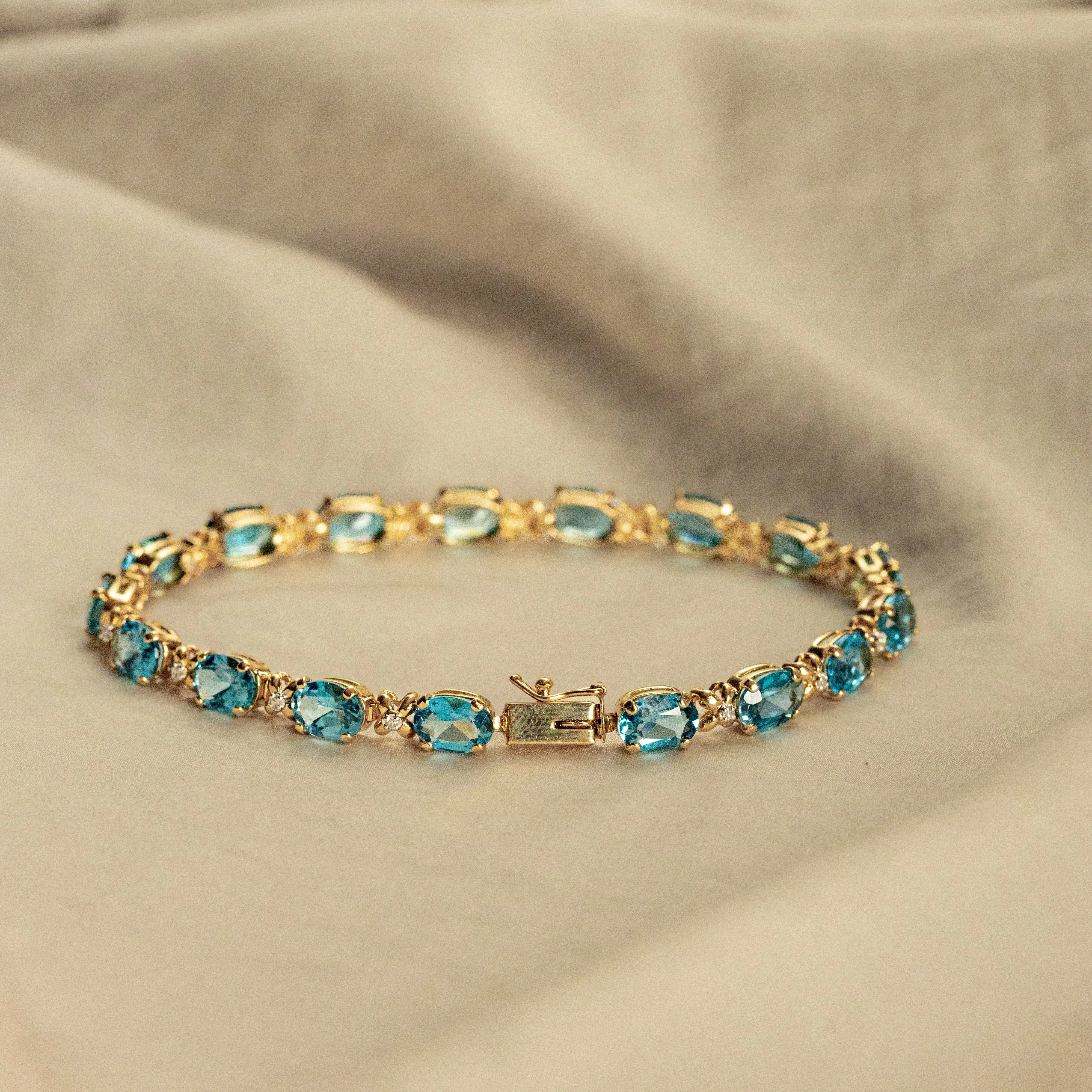 14K Yellow Gold Oval Blue Topaz Diamond Bracelet