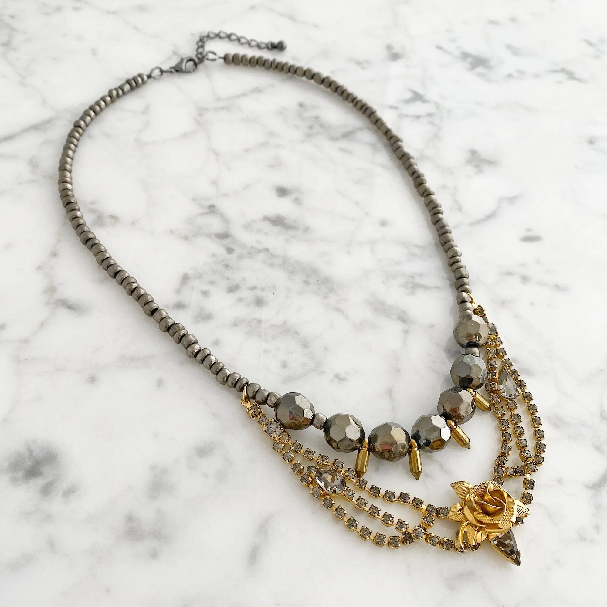 ZAYDEN hematite and gold necklace